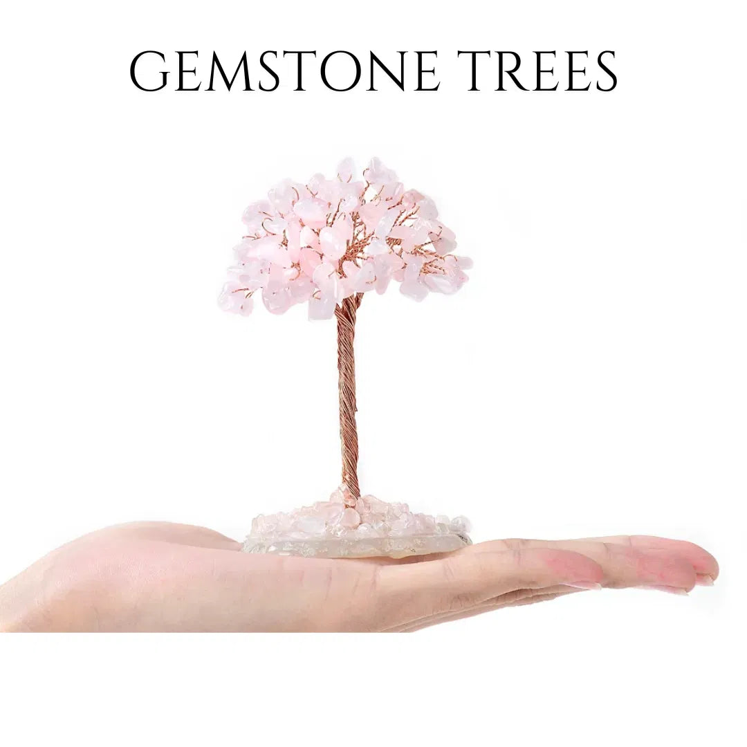 Gemstone Trees — rose quartz chip tree with copper wire branches held in an open hand