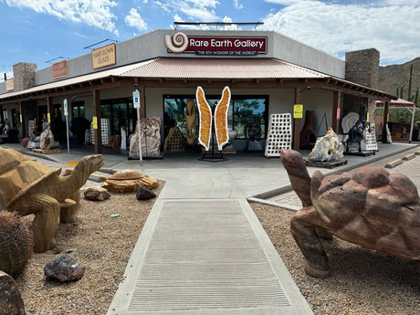Crystals and sculptures surrounding the front doors of Rare Earth Gallery in Cave Creek, AZ.
