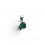Rare Earth Gallery rough freeform emerald pendant set in a 925 sterling silver bezel with decorative side beading.