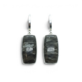 Rare Earth Gallery golden seraphinite dangle earrings featuring elongated rectangle cabochons in silver bezels.