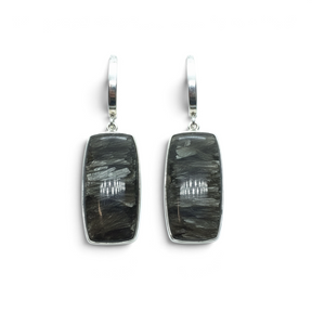 Rare Earth Gallery golden seraphinite dangle earrings featuring elongated rectangle cabochons in silver bezels.
