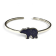 Rare Earth Gallery lapis lazuli twist bangle bracelet featuring a grizzly bear inlay with a polished silver bezel.