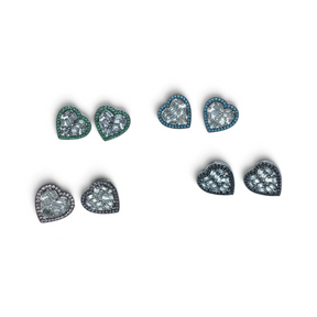 Rare Earth Gallery heart-shaped stud earrings featuring baguette-cut nano stones with vibrant colored stone borders.