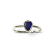 Rare Earth Gallery size 6 ring featuring a deep blue freeform Lapis Lazuli stone set in a simple silver bezel.