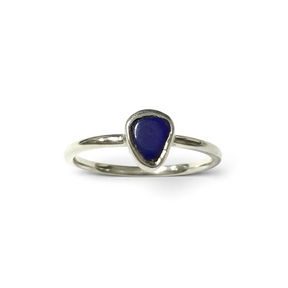 Rare Earth Gallery size 6 ring featuring a deep blue freeform Lapis Lazuli stone set in a simple silver bezel.