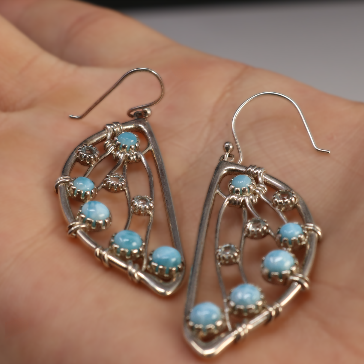 View of Larimar Dangle Earrings -Rounds With Blue Topaz On Butterfly Wing Halves
