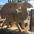 View of Hand-carved Tan Travertine Dragon - Large With Quartz Pockets