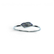 Rare Earth Gallery freeform labradorite gemstone bracelet featuring a polished silver bezel setting on a thin band.