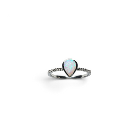 Rare Earth Gallery pear-shaped white opal ring featuring a delicate silver textured beaded band.