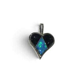 Rare Earth Gallery heart pendant featuring black onyx and blue opal inlay in a delicate silver setting.