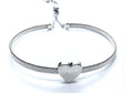 White gold plated mesh bracelet with polished heart centerpiece, adjustable