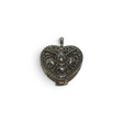 Rare Earth Gallery sterling silver heart locket featuring intricate beaded filigree and floral embossed details.