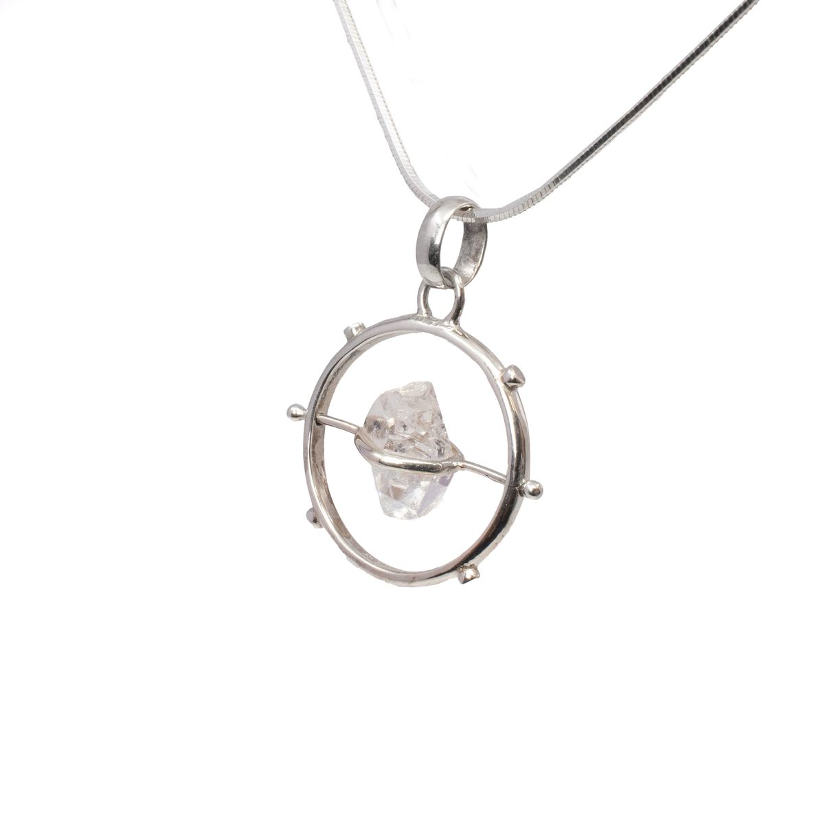 View of Herkimer Diamond Pendant - Freeform Set On Rotating Silver Bar In Open Silver Circle