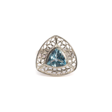 View of Blue Topaz Ring - Trillion With Silver Bezel & Silver Wire Looped Leaf Design Edge Sz8