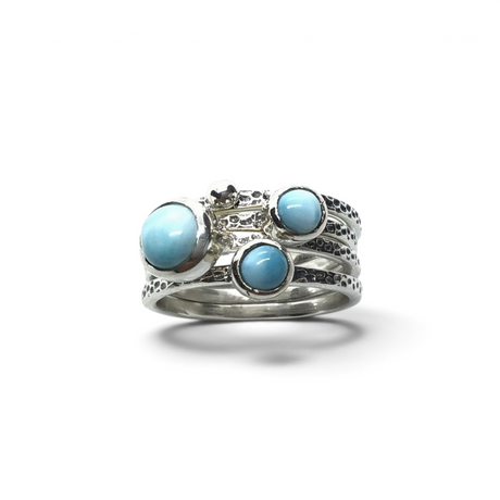 Rare Earth Gallery larimar ring set featuring four round cabochons on hammered 925 sterling silver bands with a bead