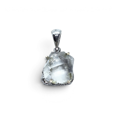 Rare Earth Gallery quartz crystal pendant featuring an organic raw crystal specimen in a stamped silver prong setting