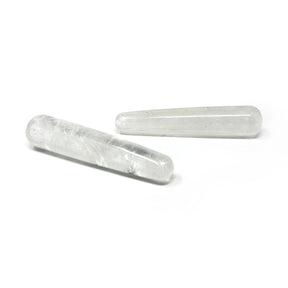 Two clear quartz massage wands, translucent with natural veils