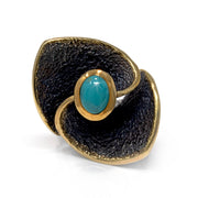 New Mexico turquoise ring, oval cabochon on a textured oxidized silver flower-petal band with gold vermeil accents