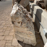 Side view of the Sunset Fossil Onyx fountain showing its cut faces and horizontal cream banding
