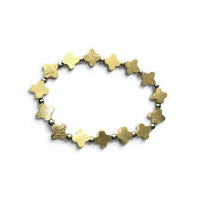 Rare Earth Gallery gold-coated Muonionalusta meteorite trefoil bracelet with polished 925 sterling silver spacers.