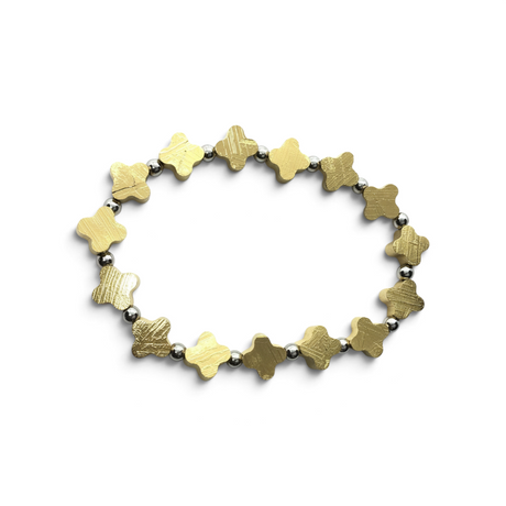 Rare Earth Gallery gold-coated Muonionalusta meteorite trefoil bracelet with polished 925 sterling silver spacers.