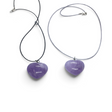Rare Earth Gallery amethyst heart pendant necklaces on black and grey cords against a white background