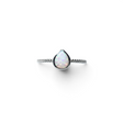 Rare Earth Gallery pear-shaped white opal ring featuring a delicate textured silver band on a white background.