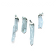 Rare Earth Gallery Faden Quartz pendants featuring elongated crystal clusters with silver-toned metal bails