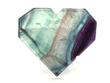 Rainbow Fluorite Heart - Flat with Faceted Faces on Lucite Stand (Vertical Banding with Dark Purple on One Curved Edge)