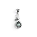 Rare Earth Gallery prasiolite pendant featuring a faceted pear-shaped stone and a small round accent in silver setting