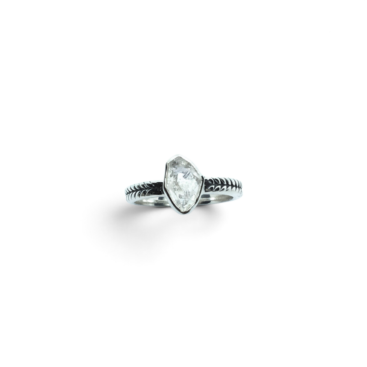 Rare Earth Gallery sterling silver ring featuring a raw Herkimer diamond in a bezel setting with a chevron band.