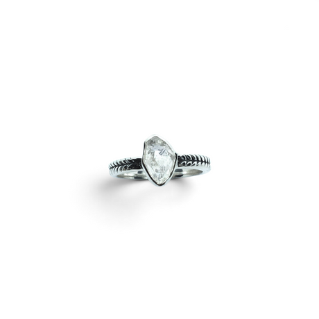 Rare Earth Gallery sterling silver ring featuring a raw Herkimer diamond in a bezel setting with a chevron band.