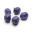 Rare Earth Gallery set of five polished chevron amethyst mini pig carvings on a white background