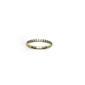 Rare Earth Gallery 2mm titanium ring with gold IP plating and a half-band of sparkling white cubic zirconia stones.