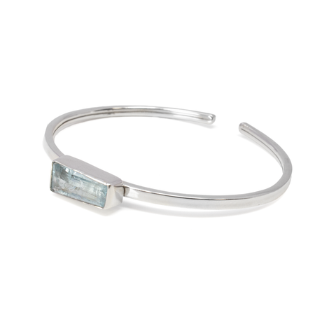 View of Faceted Aquamarine Twist Bracelet - East-west Set Tapered Rectangle With Simple Silver Bezel