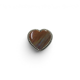 Rare Earth Gallery Arizona petrified wood heart ring with a sterling silver rope bezel and scalloped edge.