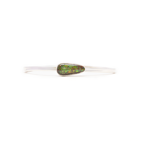 View of Ammolite Twist Bracelet - Pear Cabochon With Rounded Edges & Simple Silver Bezel