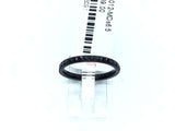 Thin black titanium band set with a row of black cubic zirconia halfway around