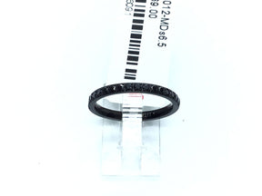 Thin black titanium band set with a row of black cubic zirconia halfway around