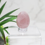 View of Rose Quartz Carved Eggs - Small with Lucite Stand