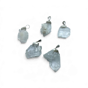 Rare Earth Gallery Faden Quartz medium cluster pendants with silver bails on a white background