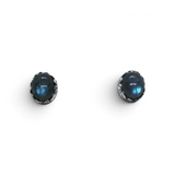 Rare Earth Gallery oval labradorite stud earrings featuring ornate floral stamped silver bezels on a white background.