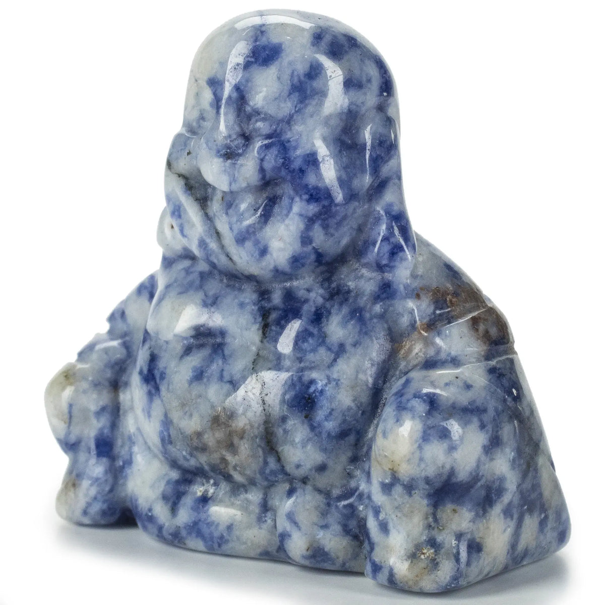 Sodalite Buddha carving at a three-quarter angle, glossy blue-and-white stone with carved robe folds