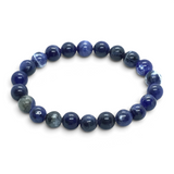 Rare Earth Gallery 8mm round sodalite beaded bracelet with deep blue stones and natural white veining on elastic cord