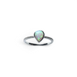 Rare Earth Gallery pear-shaped white opal ring featuring a delicate textured band on a white background.