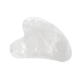 Clear quartz gua sha facial tool, translucent crystal heart-shaped stone