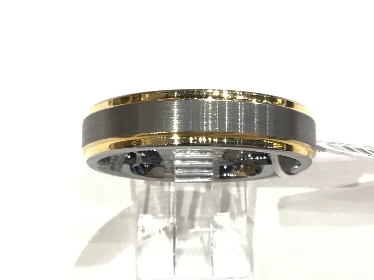 Tungsten band with brushed gray center and yellow gold-plated edges, side profile
