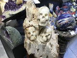 Hand-Carved Petrified Wood Skull Trio In Custom Swivel Base