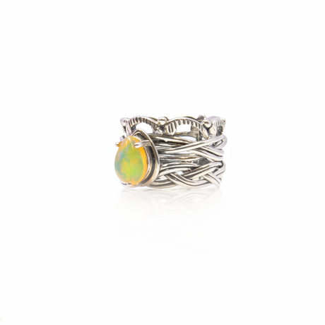 View of Ethiopian Opal Ring - Pear Cabochon Prong Set On 925 Sterling Silver Bezel With Braided & Vine Design Sz9