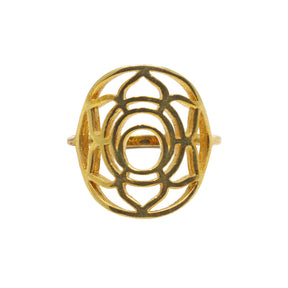 Gold-tone sacral chakra ring featuring cutout swirl lotus sacral symbol